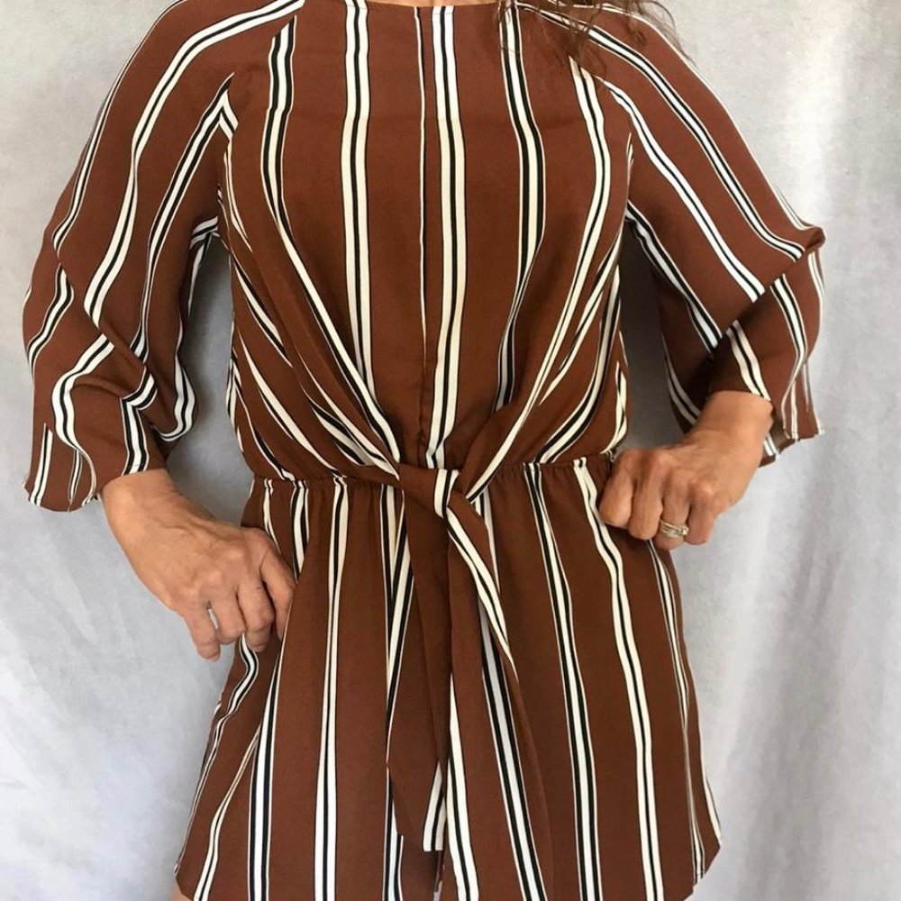 Brown jumper with white stripes